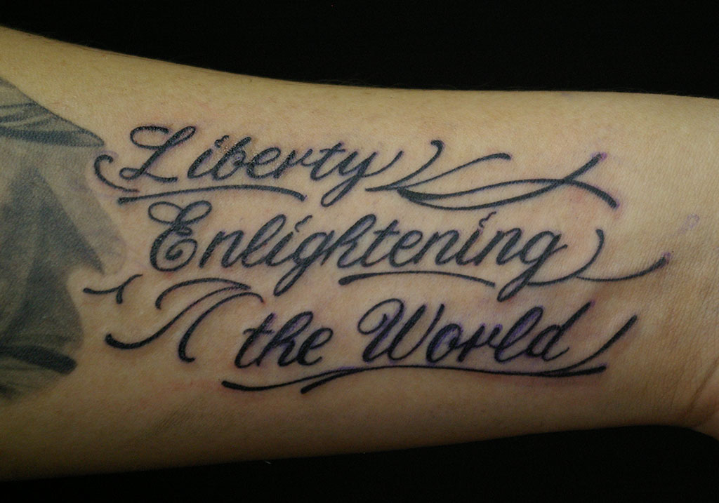 筆記体「Liberty Enlightening the World」