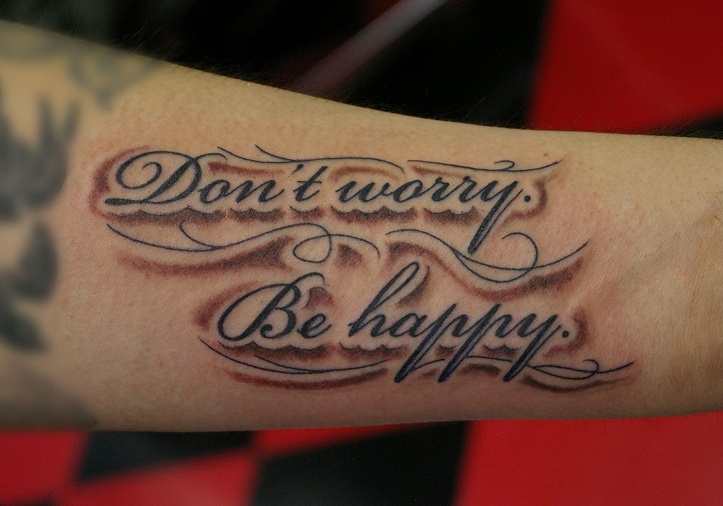 筆記体「Don’t worry. Be happy.」