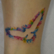 水彩画の様な鳥のタトゥー