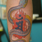 蛇と梵字のタトゥー