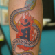 蛇と梵字のタトゥー