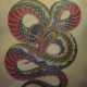 蛇背中一面のタトゥー