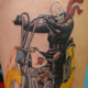 バイクに乗る魔人のタトゥー