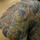 般若と桜と額のタトゥー