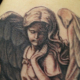 翼のある女神のタトゥー