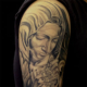 聖母マリアのスリーブのタトゥー