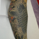 鯉と桜と打ち出の小槌と額のタトゥー
